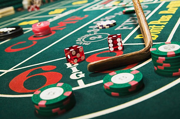 Live dealer table broadcast showing multiple camera angles and player interface on mobile screen